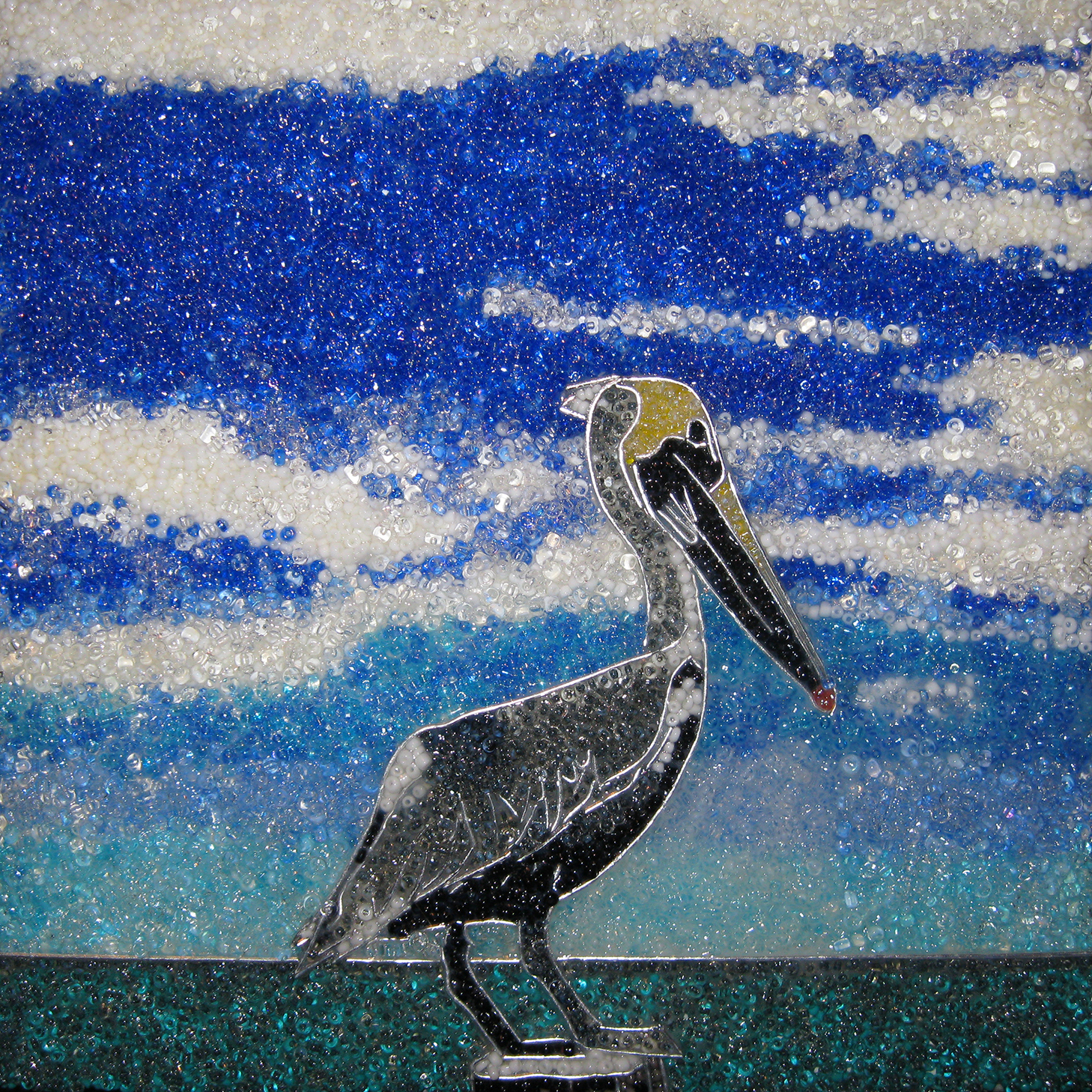 Bead painting of pelican on a post