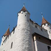 A square medieval castle with towers at each corner